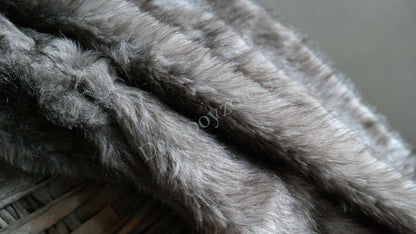 Plaid imitatiebont in bruin mix van De Hooyzolder, zachte vachtachtige textuur.
